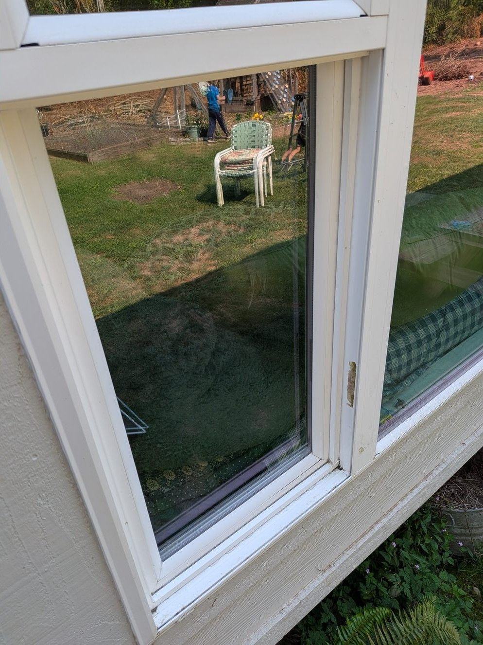 Clear, streak-free exterior window glass and frame after cleaning