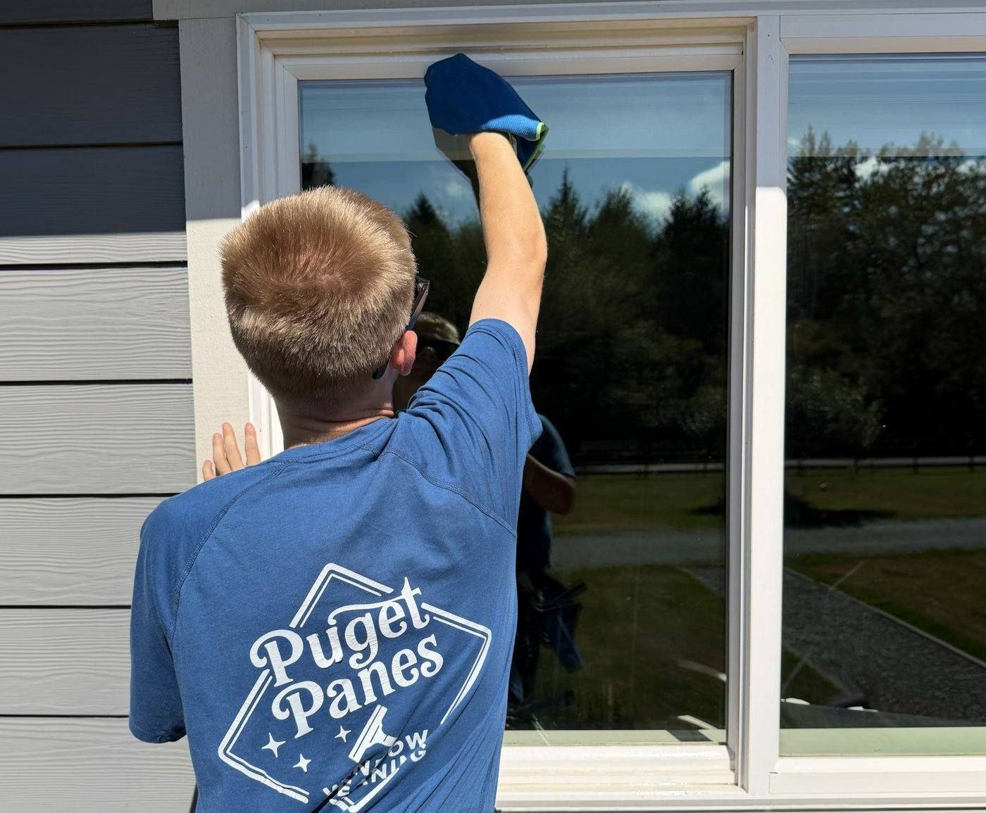 Detailing window glass with a microfiber scrubbing pad